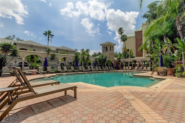 view of pool featuring a patio