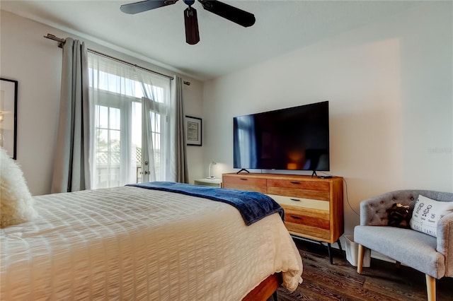 bedroom with dark wood-type flooring and ceiling fan