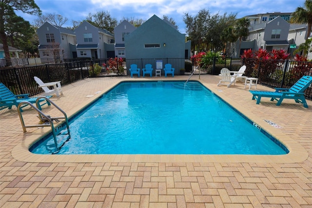 view of swimming pool featuring a patio