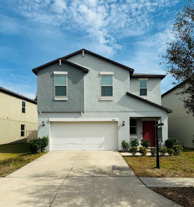 view of front property with a garage