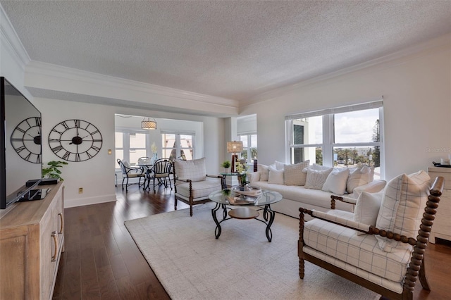 living room featuring crown molding, plenty of natural light, and a textured ceiling