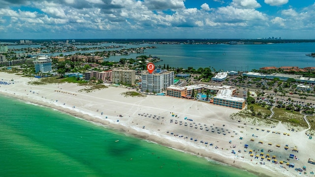 drone / aerial view with a water view and a view of the beach