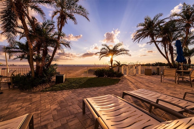 view of patio terrace at dusk