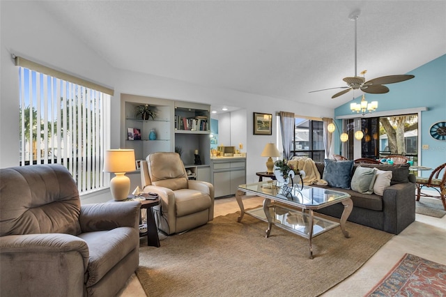 living room featuring built in shelves, ceiling fan, and lofted ceiling