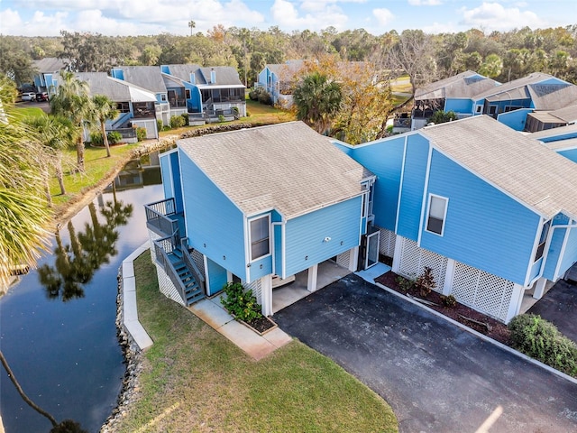 bird's eye view with a water view