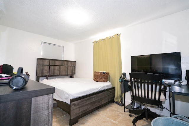 bedroom with a textured ceiling