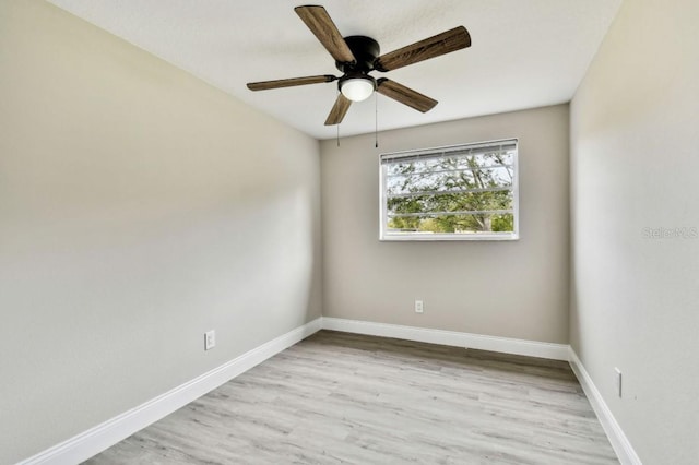 spare room featuring ceiling fan and light hardwood / wood-style flooring