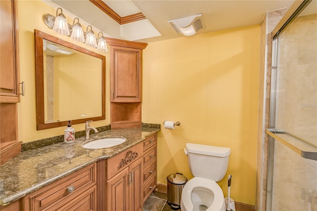 bathroom with tile patterned flooring, vanity, toilet, walk in shower, and ornamental molding