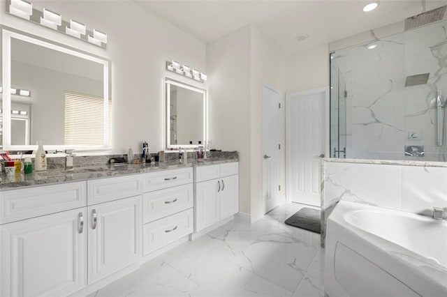 bathroom with vanity and plus walk in shower