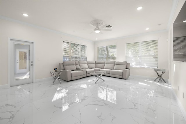 living room with ceiling fan and ornamental molding