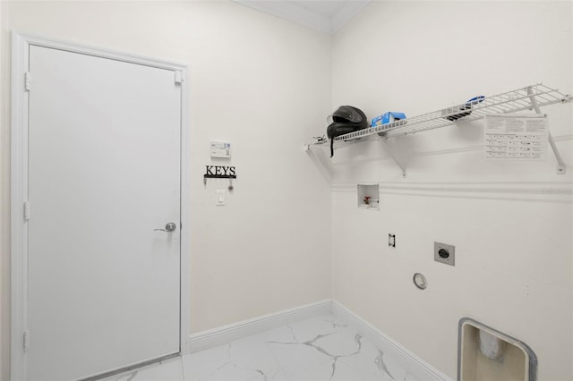 laundry area featuring ornamental molding, hookup for a washing machine, and electric dryer hookup