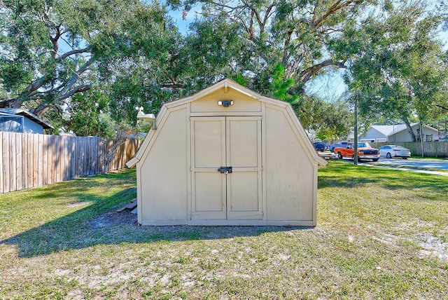 view of outdoor structure featuring a yard