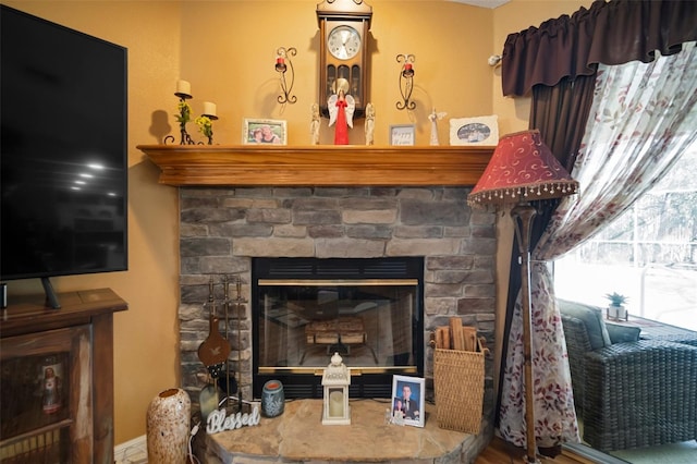 room details with a stone fireplace