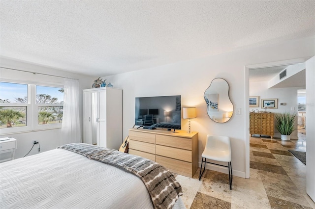 bedroom with a textured ceiling