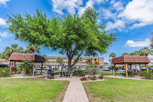 view of home's community with a gazebo and a lawn