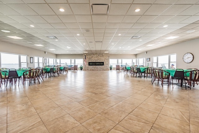 interior space featuring a drop ceiling