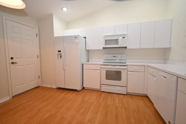 kitchen featuring light countertops, white appliances, light wood-style flooring, and white cabinets