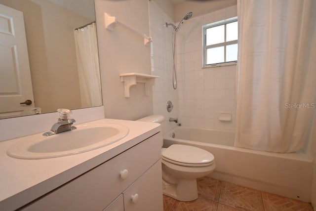 full bath featuring shower / bath combination with curtain, tile patterned flooring, vanity, and toilet