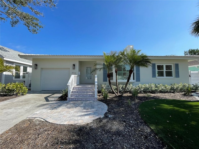 view of front of property featuring a garage