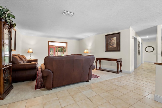 carpeted living room with a textured ceiling and ornamental molding