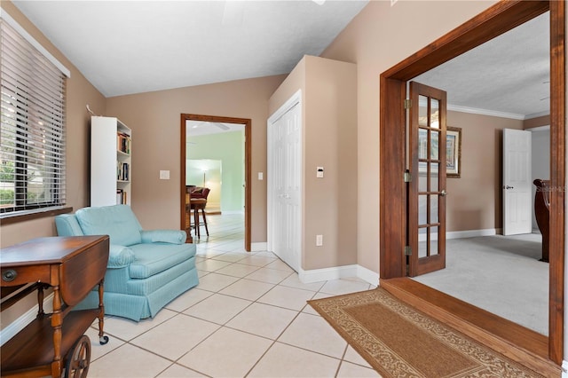 interior space with lofted ceiling and ornamental molding