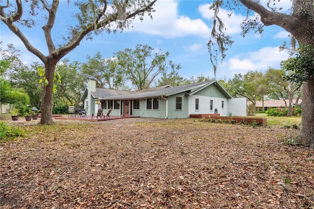 back of property with a patio area