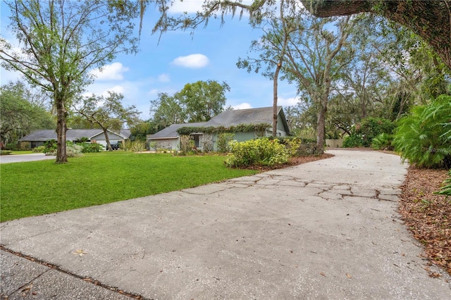 view of front of home with a front lawn