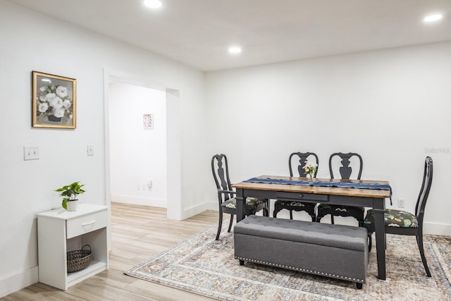 dining room featuring light hardwood / wood-style flooring