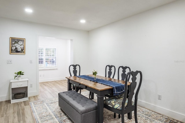 dining space featuring light hardwood / wood-style flooring