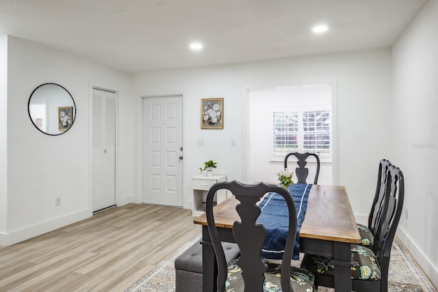 dining area with light hardwood / wood-style flooring