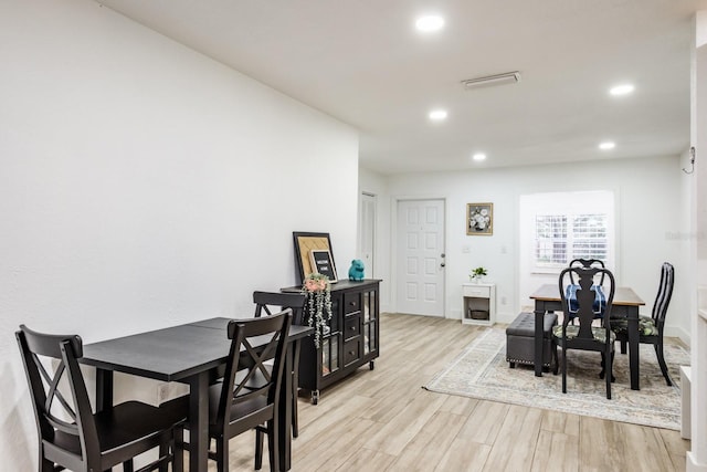 dining room featuring light wood-type flooring