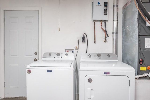 laundry room with independent washer and dryer