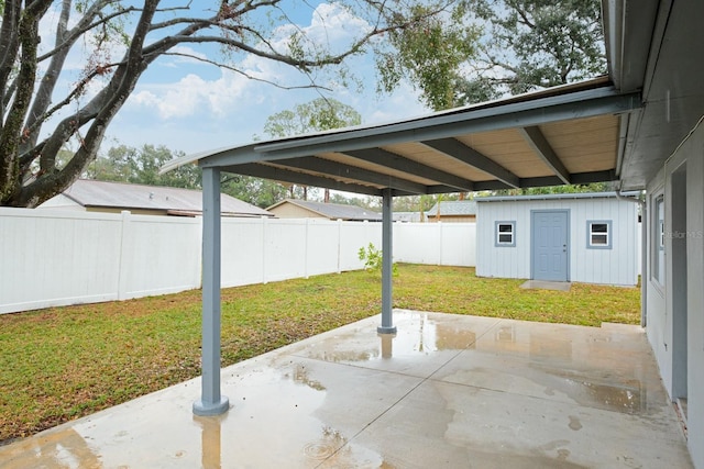 view of patio / terrace featuring an outbuilding