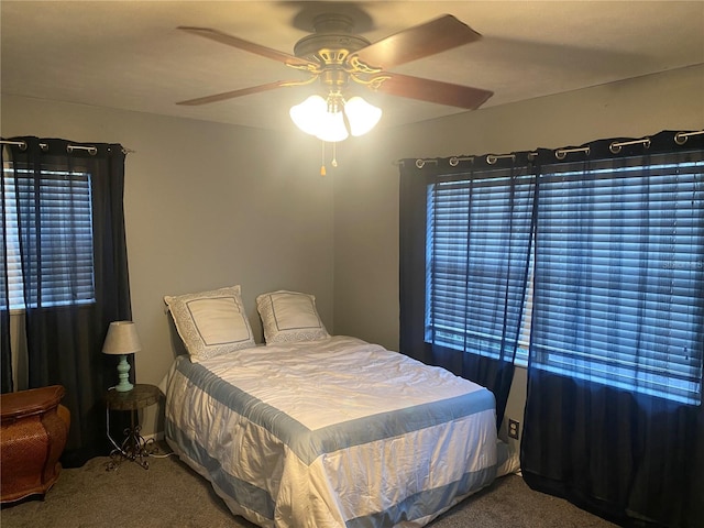 carpeted bedroom featuring a ceiling fan