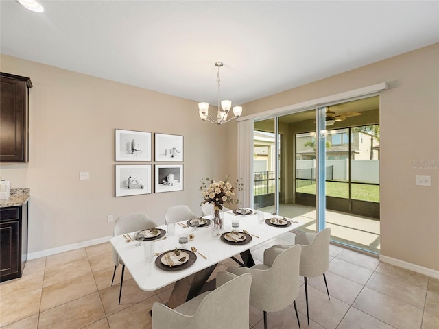 dining space featuring an inviting chandelier and light tile patterned floors