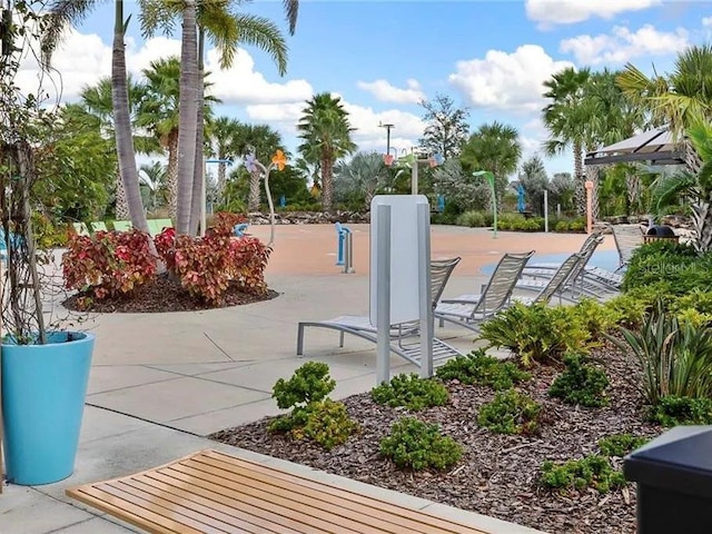 view of property's community featuring a patio