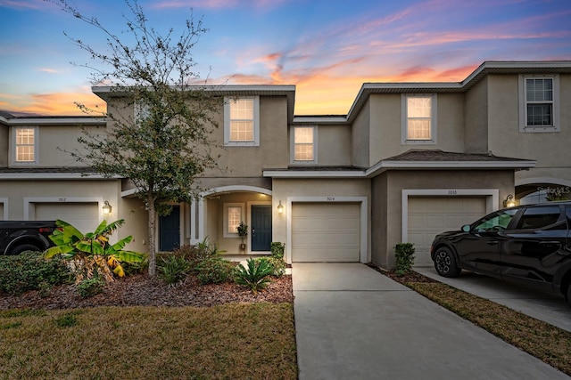 view of front of property with a garage