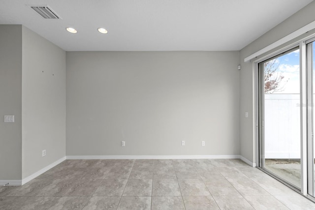 view of tiled spare room