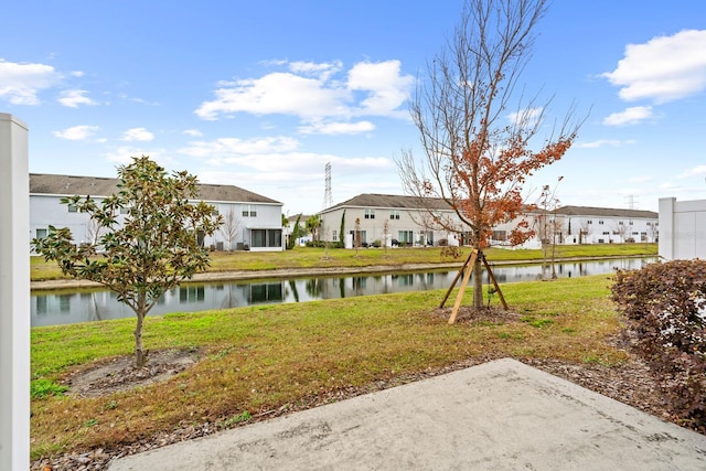 view of yard with a water view