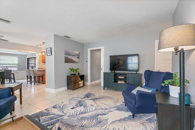 living room featuring light tile patterned floors