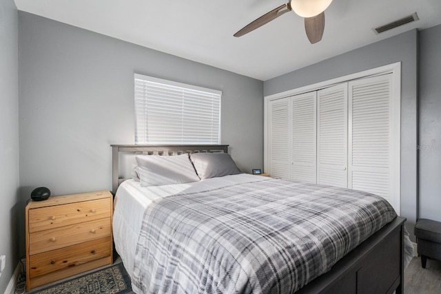 bedroom featuring a closet and ceiling fan