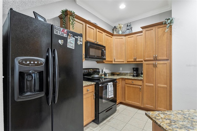 kitchen with light tile patterned flooring, black appliances, light stone countertops, and ornamental molding