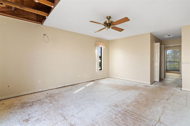 unfurnished room featuring ceiling fan