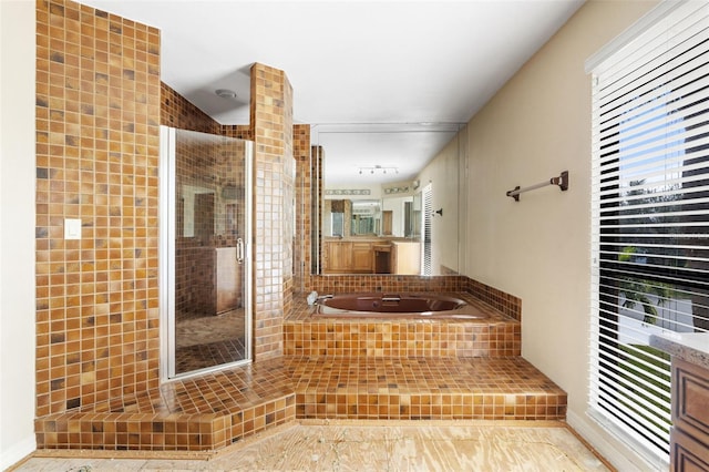 bathroom with vanity, tile patterned floors, and independent shower and bath