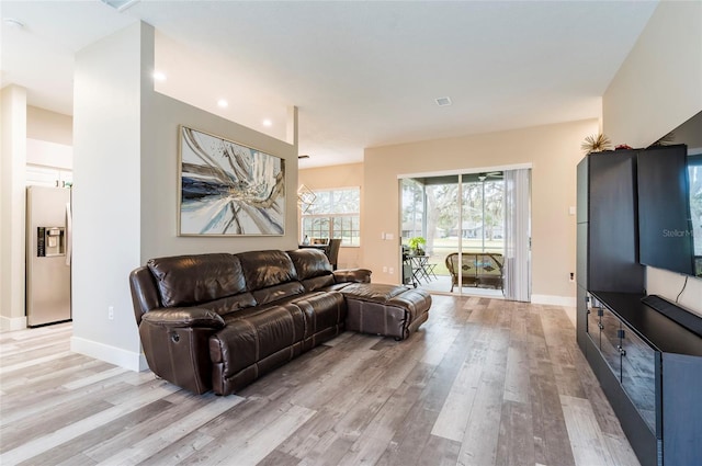 living room featuring light wood-type flooring