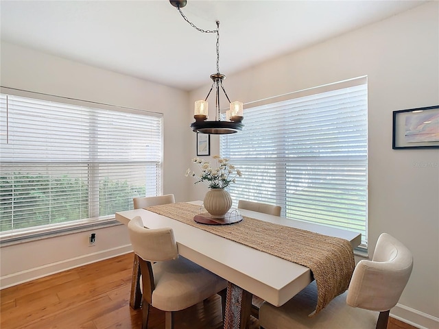 dining area featuring hardwood / wood-style floors