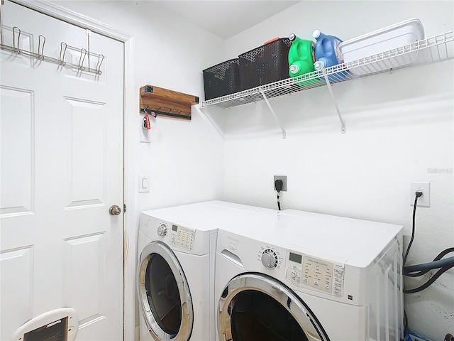 washroom featuring separate washer and dryer