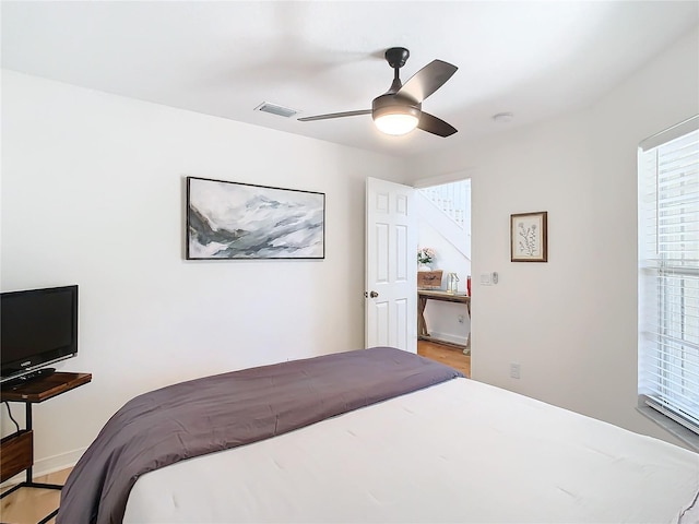 bedroom featuring ceiling fan