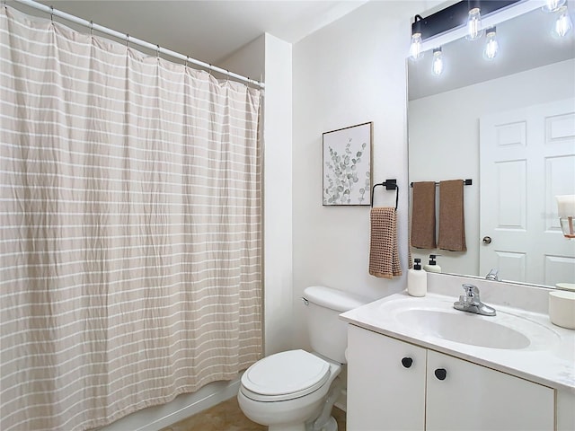 full bathroom featuring vanity, shower / tub combo with curtain, and toilet