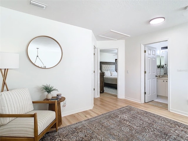 hallway with light wood-type flooring